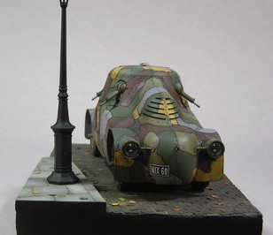 Lamppost held in place with a magnet. So model can fit into smaller box.